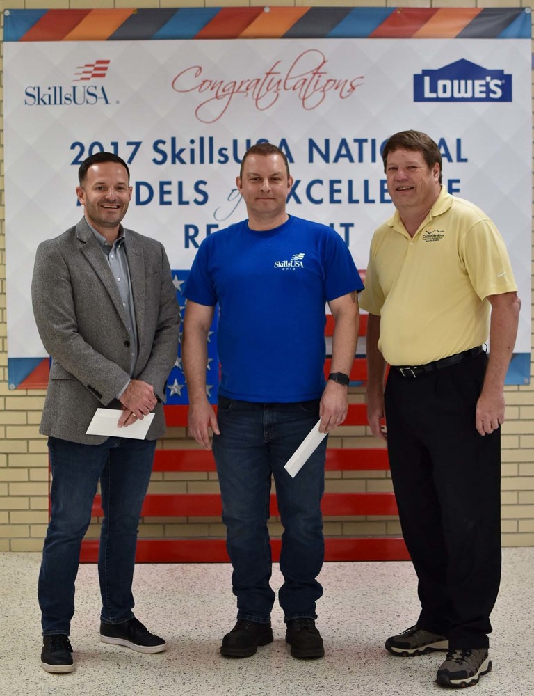 Tommy Collier, center, was nominated for Ross County Outstanding Educator Award by Superintendent Jonathan Davis, left. Scott Graham with the Community Foundation presented the award.