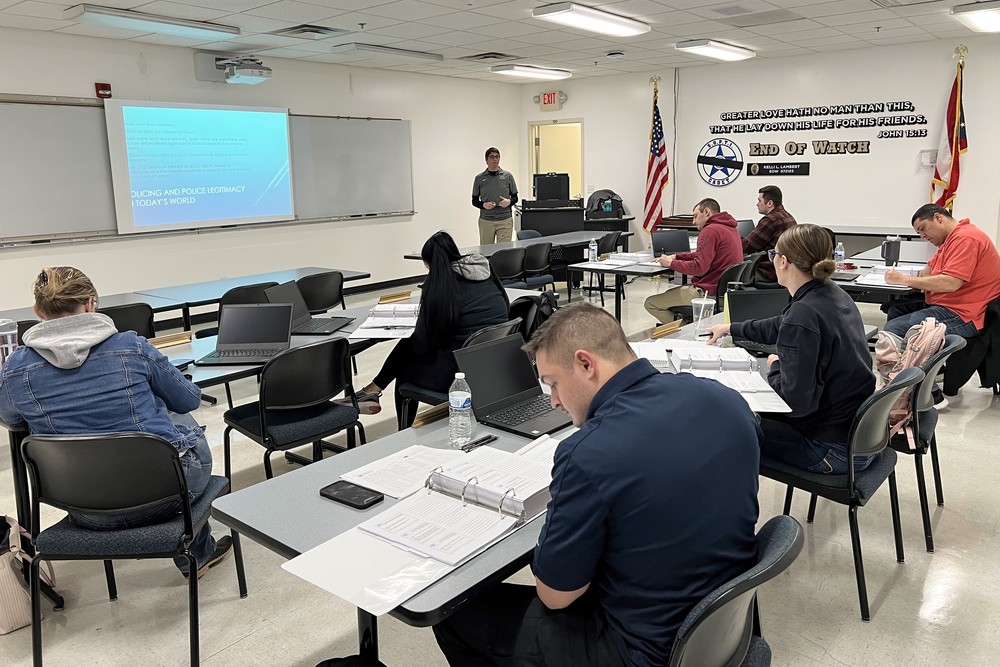 Cadets listen to an instructor during a Basic Peace Officer Academy class.
