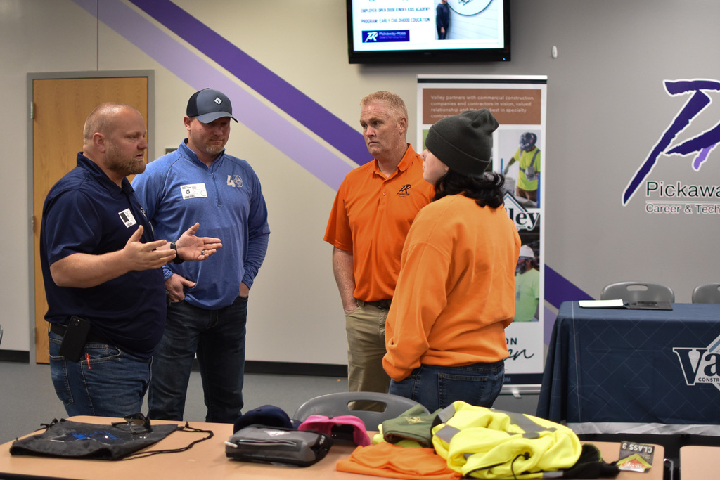 Addison speaking with Valley and Mr. McManes